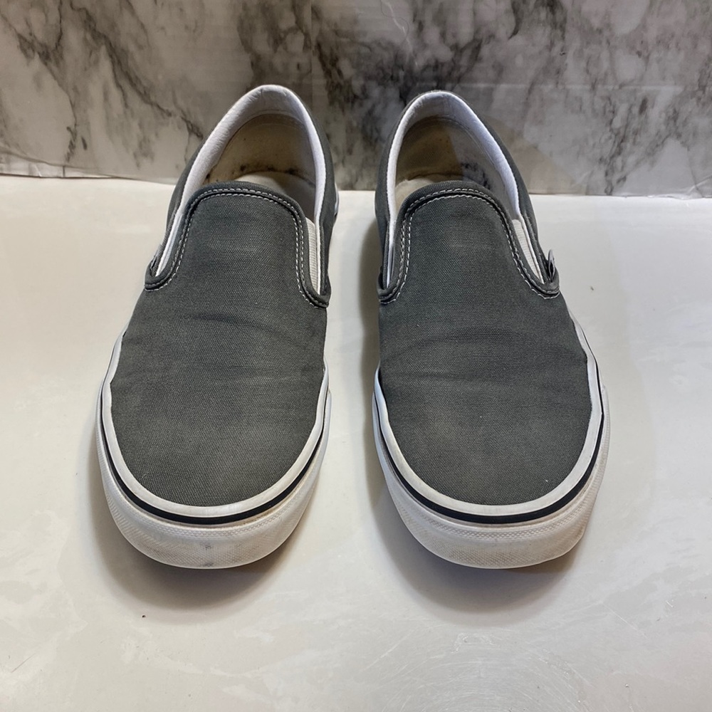 Gray slip on vans
